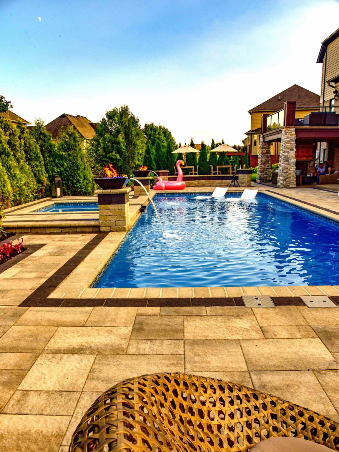 fiberglass pool designers in Shelby Twp, Mi landscape design project in Shelby Township cascade fiberglass swimming pool design with a raised spillover spa  Outdoor Fire Features Fire Pit Designs Fire Feature Ideas