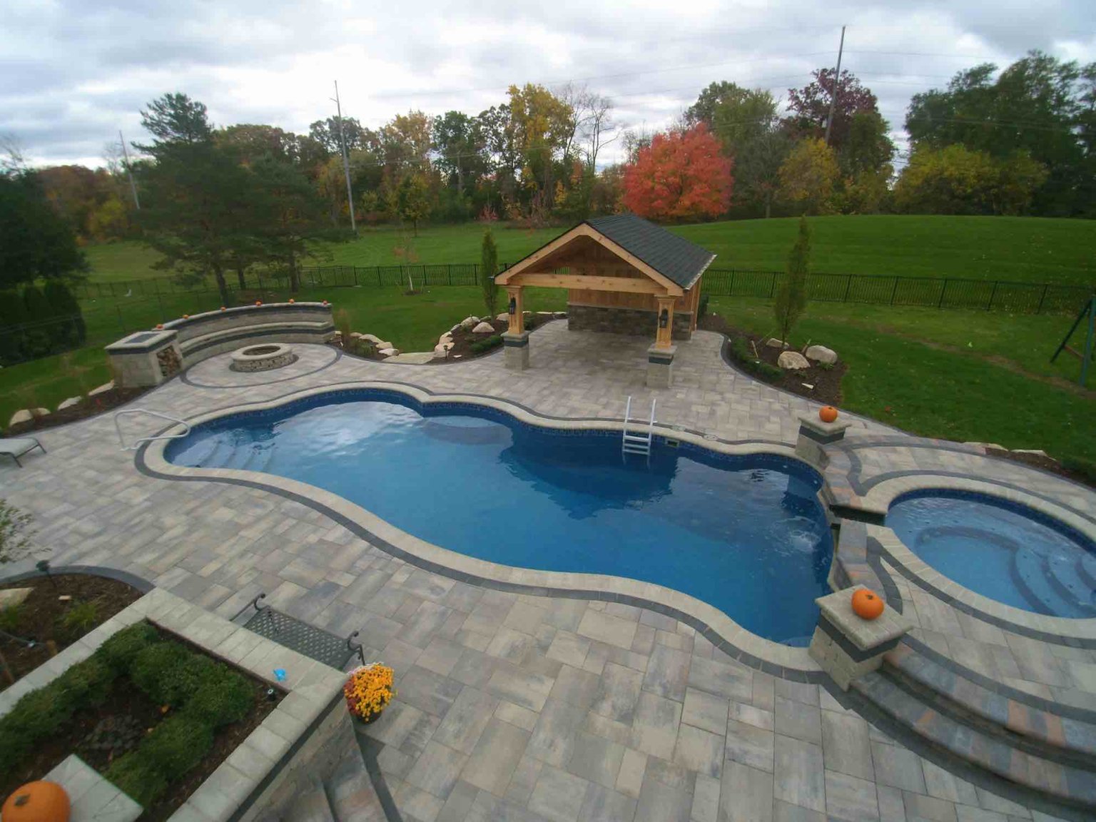 Outdoor Fire Features Fire Pit Designs Fire Feature Ideas Gas Fire Pits Outdoor Fireplaces Fire Pit Installation shade structure builders michigan outdoor pavilion patio pavilion pavilion designers mi Gunite Pool Construction Custom Gunite Pool Designs Gunite Pool Installation Gunite Pool vs. Vinyl Pool Gunite Pool Benefits Gunite Pool Cost Gunite Pool Maintenance pool and spa design Metro Detroit Metro Detroit pool and spa experts Custom pool design Metro Detroit Spa installation in Metro Detroit Metro Detroit outdoor spa design Residential pool design Metro Detroit Metro Detroit luxury pool and spa Pool and spa renovation Metro Detroit Metro Detroit backyard pool design Metro Detroit pool and spa builders Metro Detroit pool and spa contractors