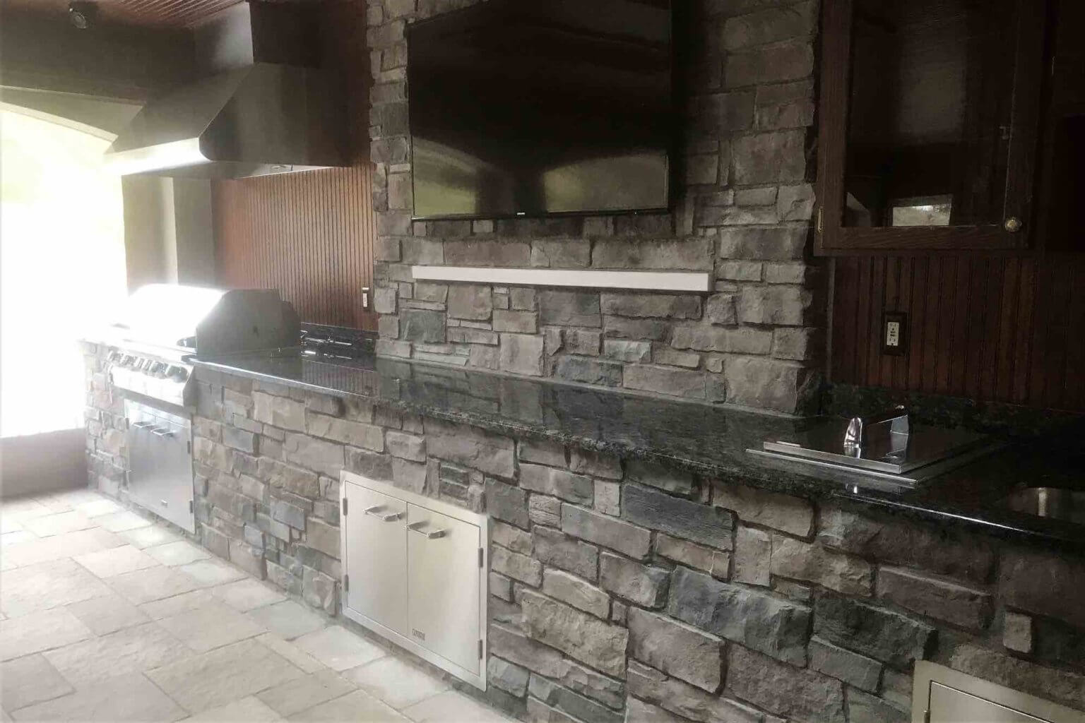 poolside kitchen with bar & TV
