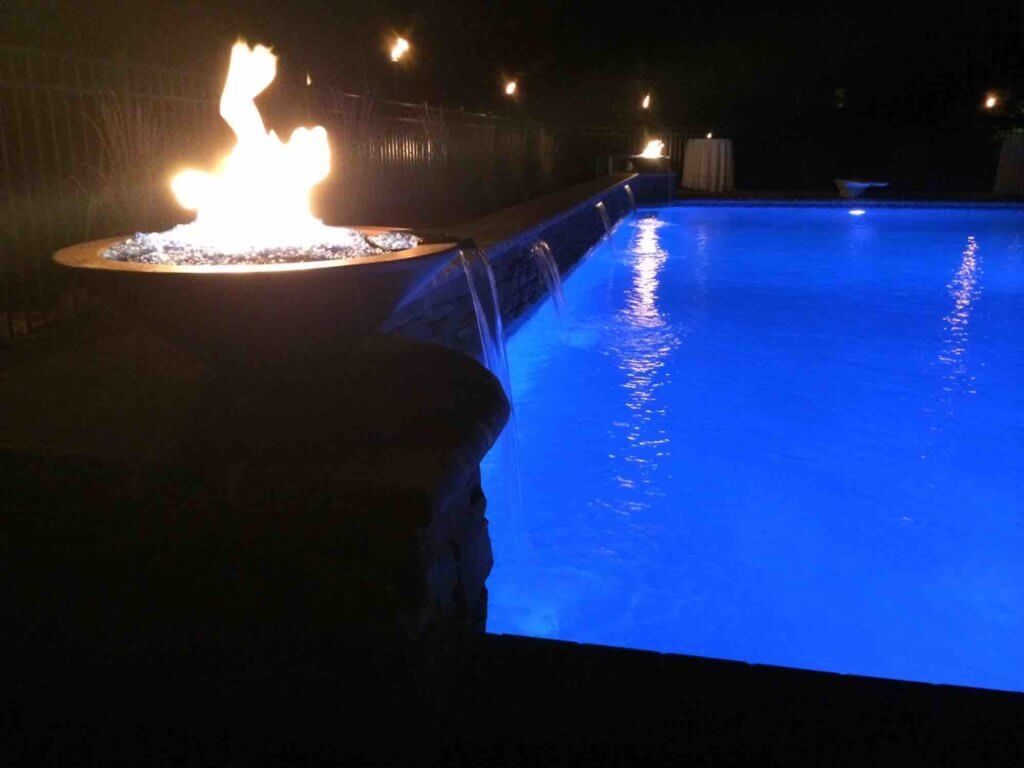 fire pits and backyard ideas, patio paving ideas, in-ground pool with waterfall