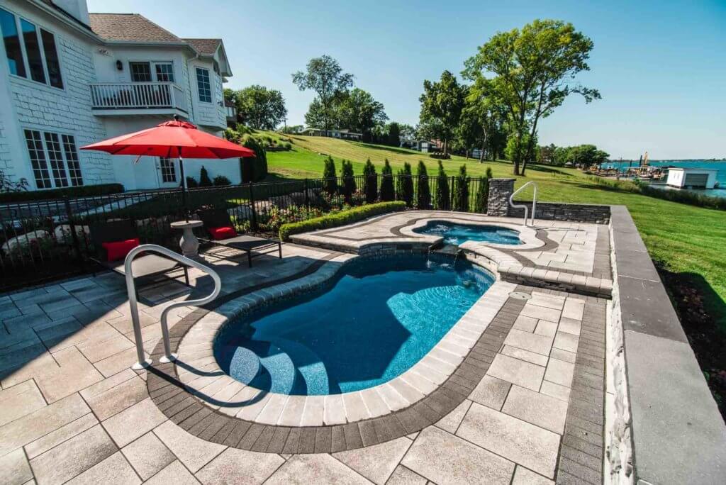 pool lighting, pool lights, pool inspo, bricks paving, paver patios, brick pavers, landscape design, pool and spa design, outdoor living