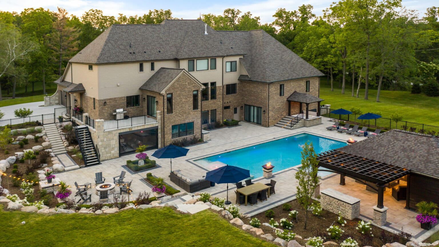 gunite pools, patio pavers, concrete paving, inground pools, pool and spa, fire bowls, patio covers in michigan, patio ideas, pool inspo, gazebos in michigan, cabanas in Michigan, backyard design, backyard landscape design, fire bowls, pool fountains, concrete builders, unilock, outdoor fireplaces in michigan, jacuzzi, outdoor hot tubs, pergola, gazebo, backyard ideas, patio design near me, fire glass, backyard ideas, landscape architecture
