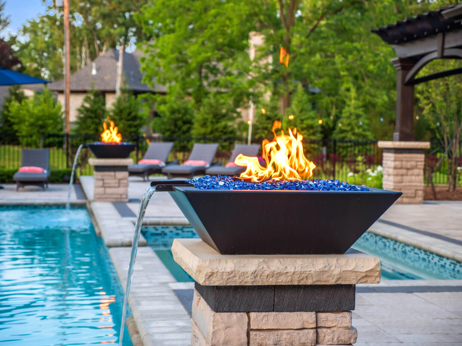 gunite pools, patio pavers, concrete paving, inground pools, pool and spa, fire bowls, patio covers in michigan, patio ideas, pool inspo, gazebos in michigan, cabanas in Michigan, backyard design, backyard landscape design, fire bowls, pool fountains, concrete builders, unilock, outdoor fireplaces in michigan, jacuzzi, outdoor hot tubs, pergola, gazebo, backyard ideas, patio design near me, fire glass