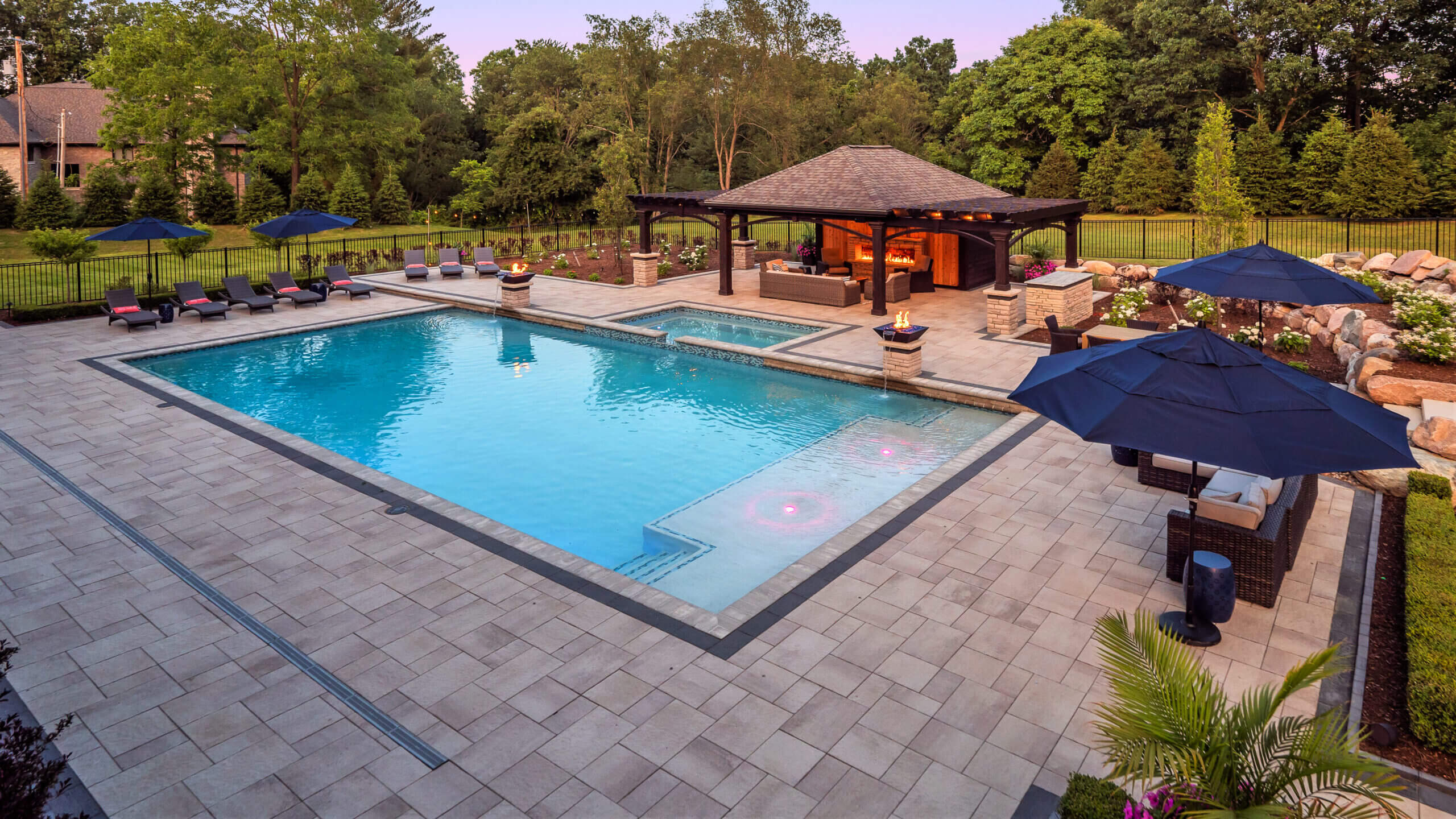 gunite pools, patio pavers, concrete paving, inground pools, pool and spa, fire bowls, patio covers in michigan, patio ideas, pool inspo