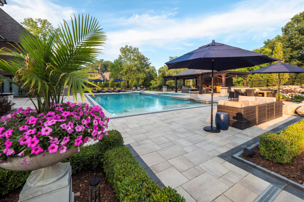 hedges, gunite pools, patio pavers, concrete paving, inground pools, pool and spa, fire bowls, patio covers in michigan, patio ideas, pool inspo, gazebos in michigan, cabanas in Michigan, backyard design, backyard landscape design, fire bowls, pool fountains, concrete builders, unilock, outdoor fireplaces in michigan, jacuzzi, outdoor hot tubs, pergola, gazebo, backyard ideas, patio design near me, fire glass, backyard ideas, landscape architecture, landscaping services, outdoor design inspo, cabana, fire pit, fire pits near me, brick paving, patio stones, patio steps, unilock pavers pool designers near me