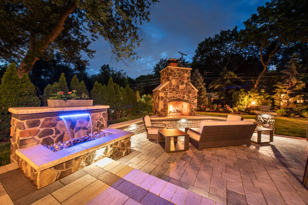 Outdoor Fire Features Fire Pit Designs Fire Feature Ideas Gas Fire Pits Outdoor Fireplaces Fire Pit Installation Custom Fire Features Michigan Pavers Paver Installation Michigan Paver Contractors in Michigan Best Pavers in Michigan Michigan Patio Pavers Driveway Pavers Michigan Walkway Pavers Michigan Michigan Paver Stones Custom Pavers Michigan Michigan Paver Design Paver Repair Michigan Paver Maintenance Michigan Interlocking Pavers Michigan